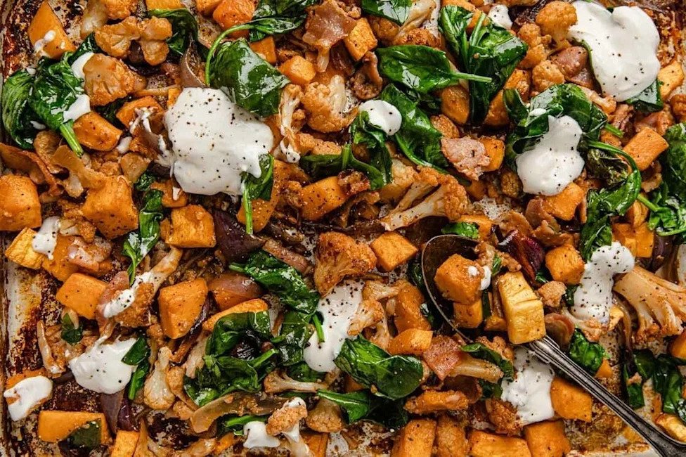 Roasted cubed butternut squash with cauliflower and bacon